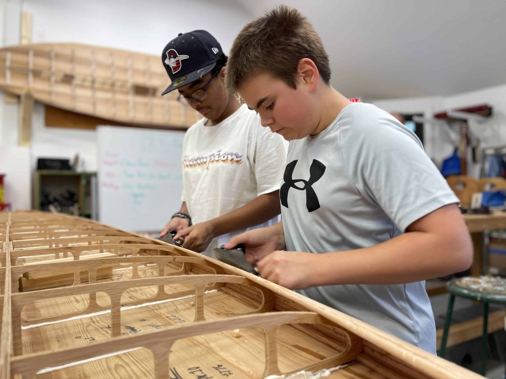 This winter, participants in the Rising Tide after-school program are set to begin work, alongside apprentices from CBMM’s Shipyard, on the build of a St. Michaels scow.